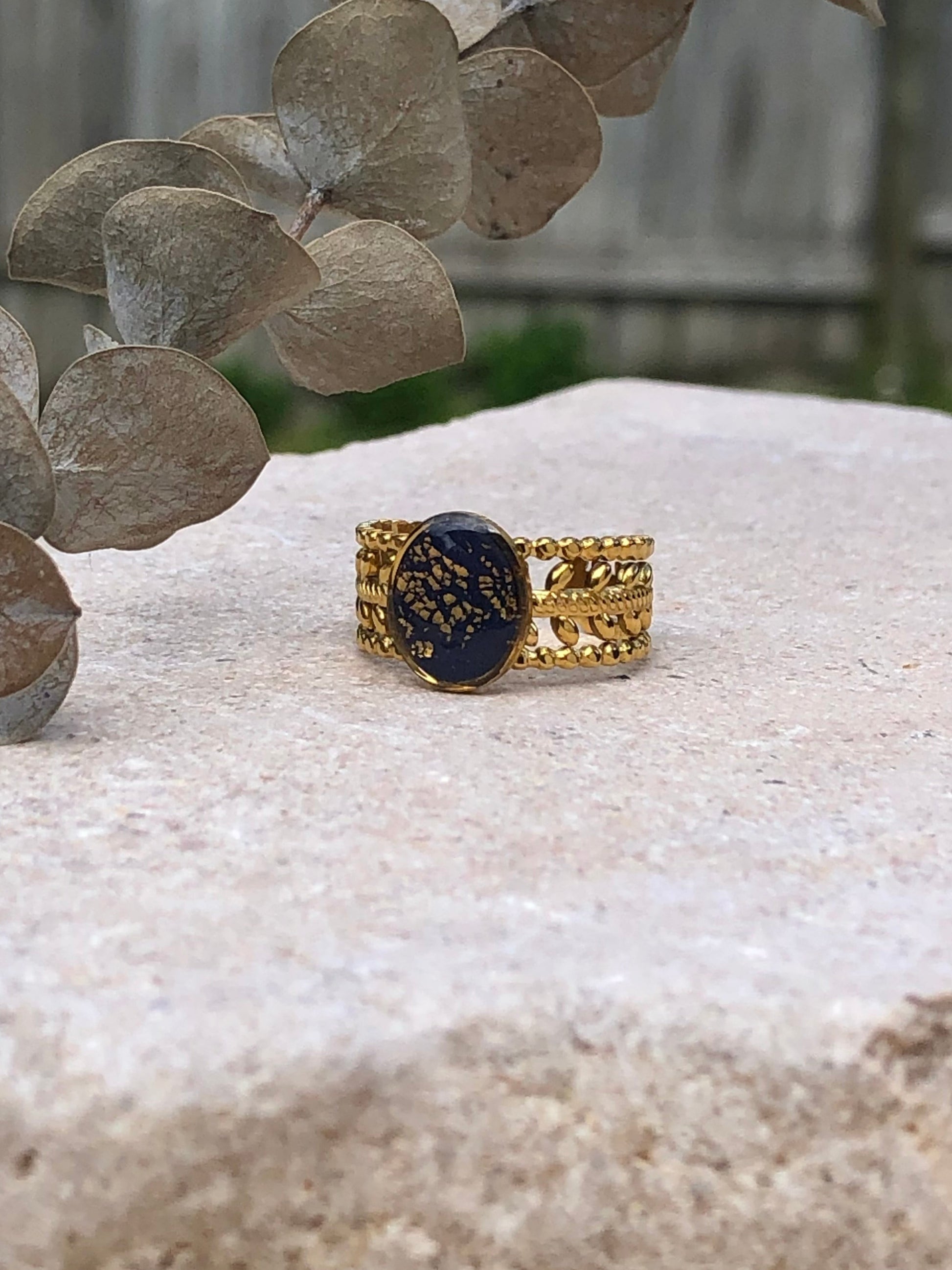 Stainless steel ring with PolymerClay and resin. 